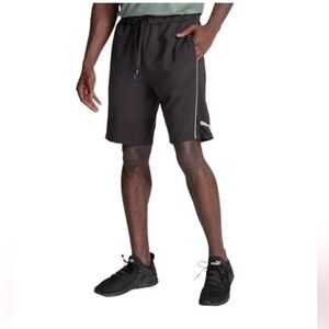 NWOT Men’s black Puma stretchlite knit shorts with white piping.  Size medium